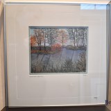 A44. Framed landscape emrboidery.